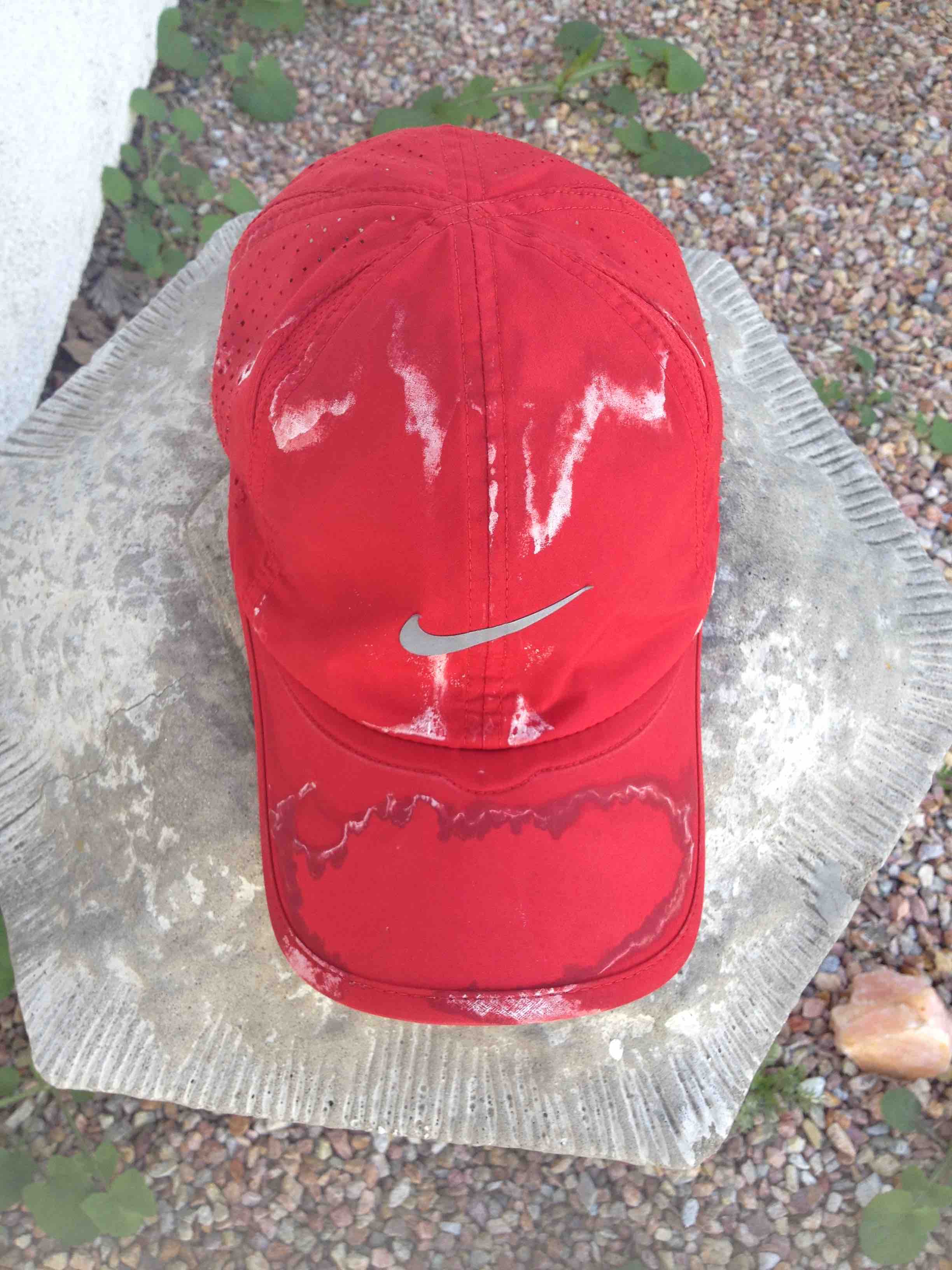 red hat with sweat stains